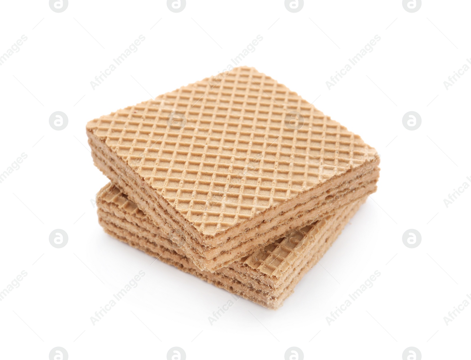 Photo of Delicious crispy wafers on white background. Sweet food