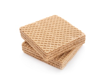 Photo of Delicious crispy wafers on white background. Sweet food