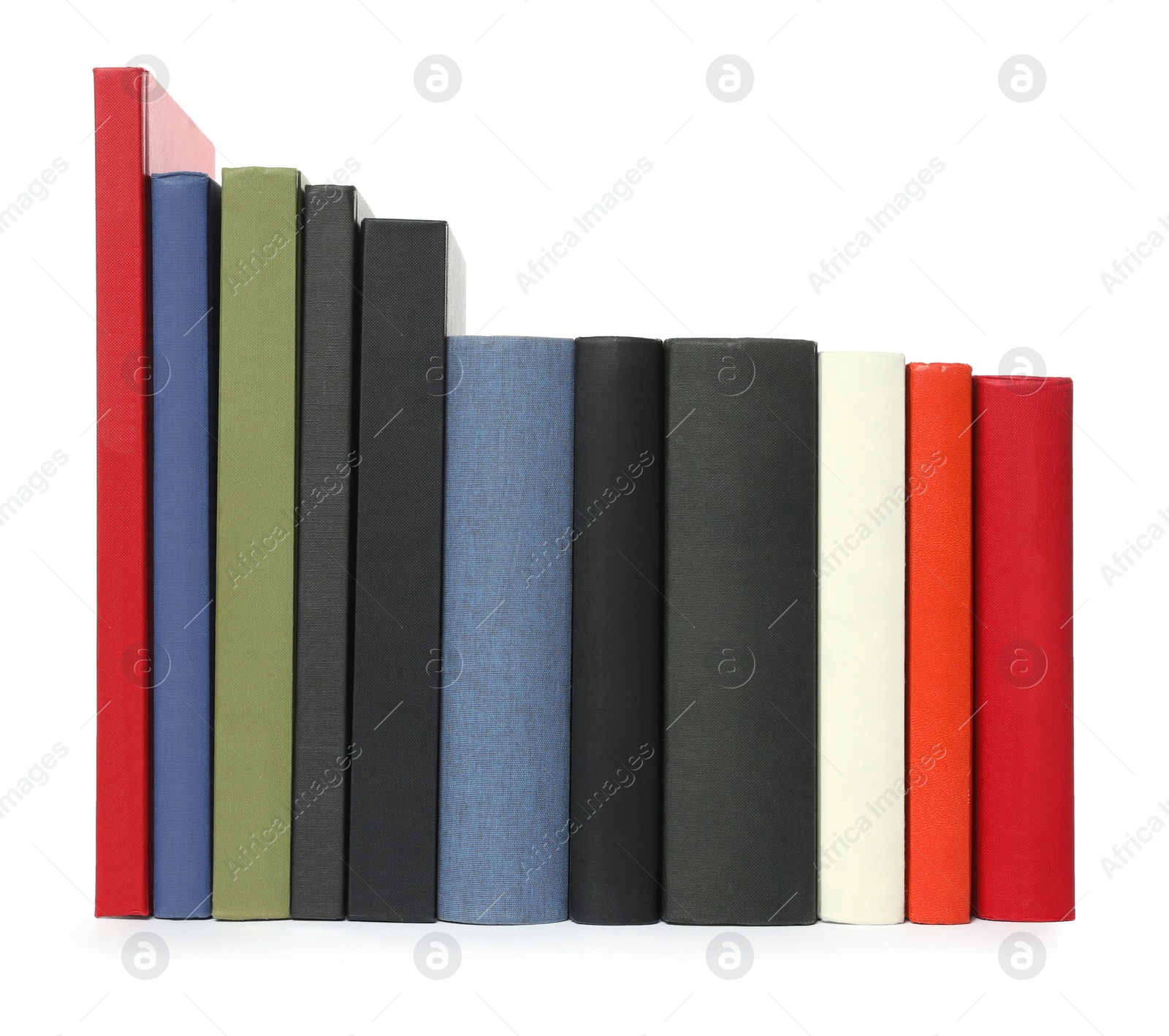 Photo of Many different hardcover books on white background