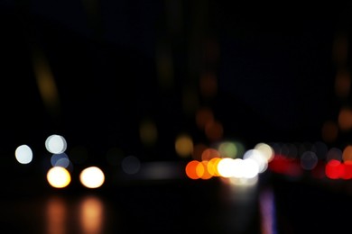 Blurred view of city lights at night. Bokeh effect