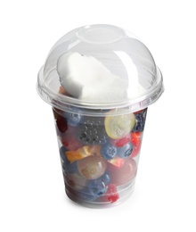 Photo of Fresh tasty fruit salad in plastic cup on white background