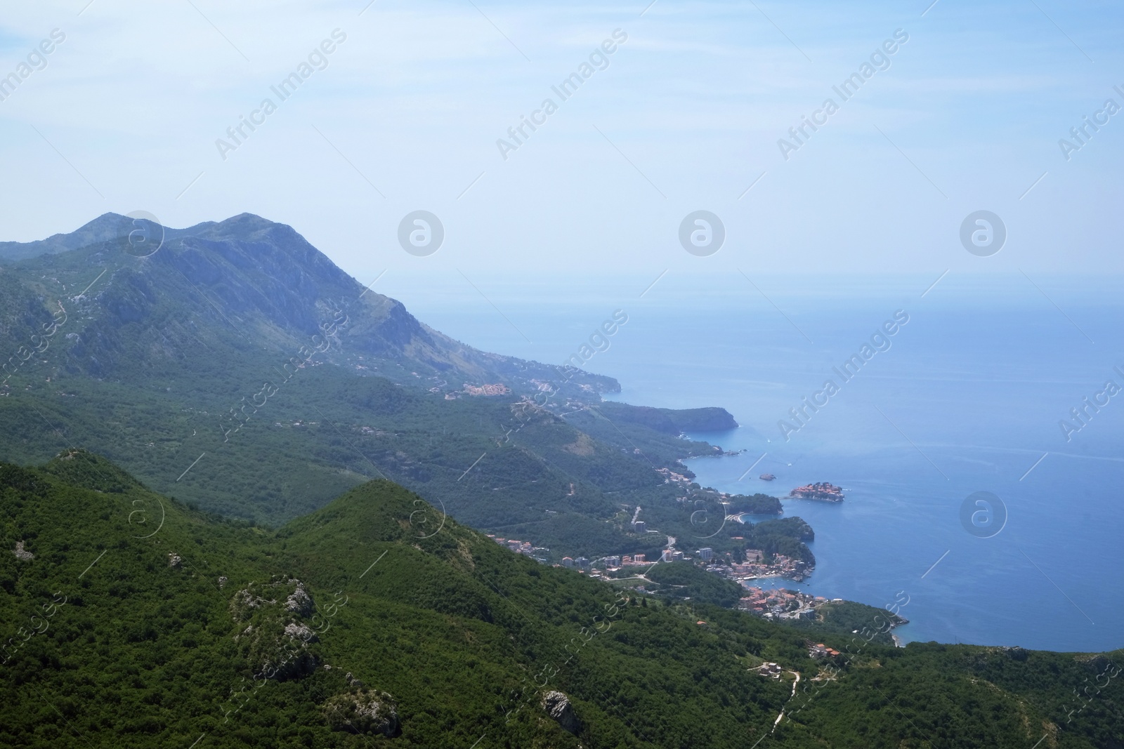 Photo of Picturesque view of beautiful mountains and sea on sunny day