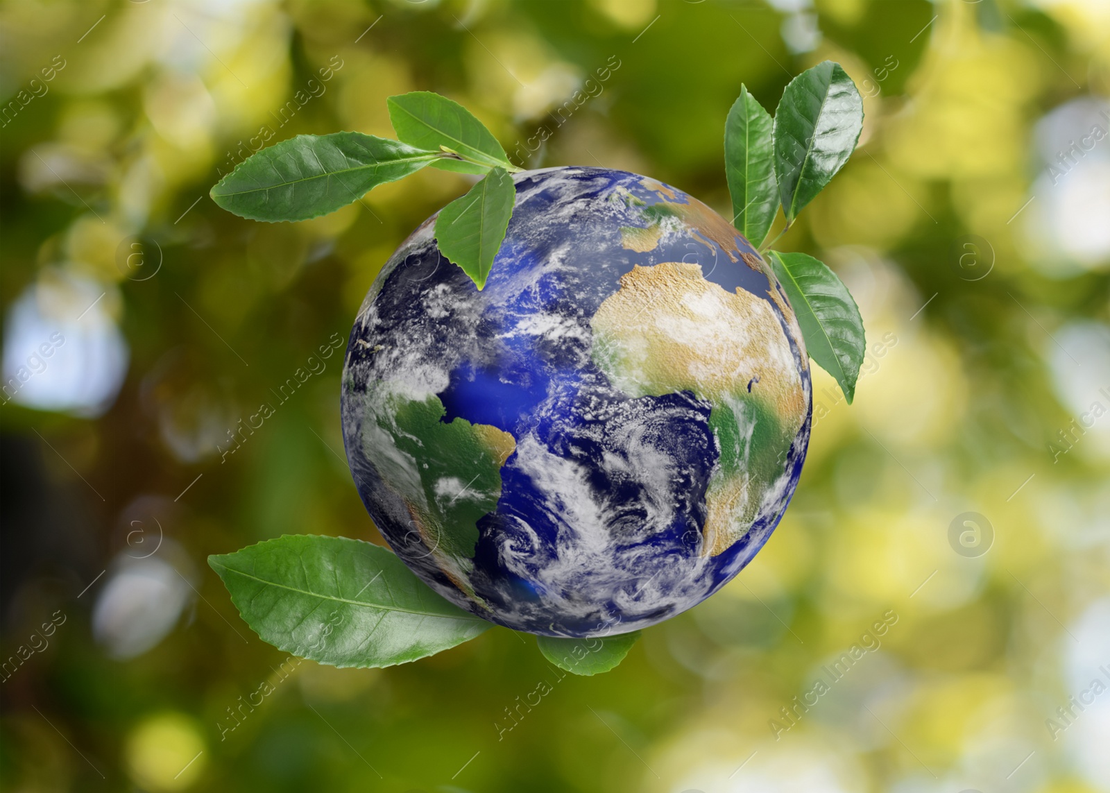 Image of Recycling concept. Earth planet with green leaves on blurred background