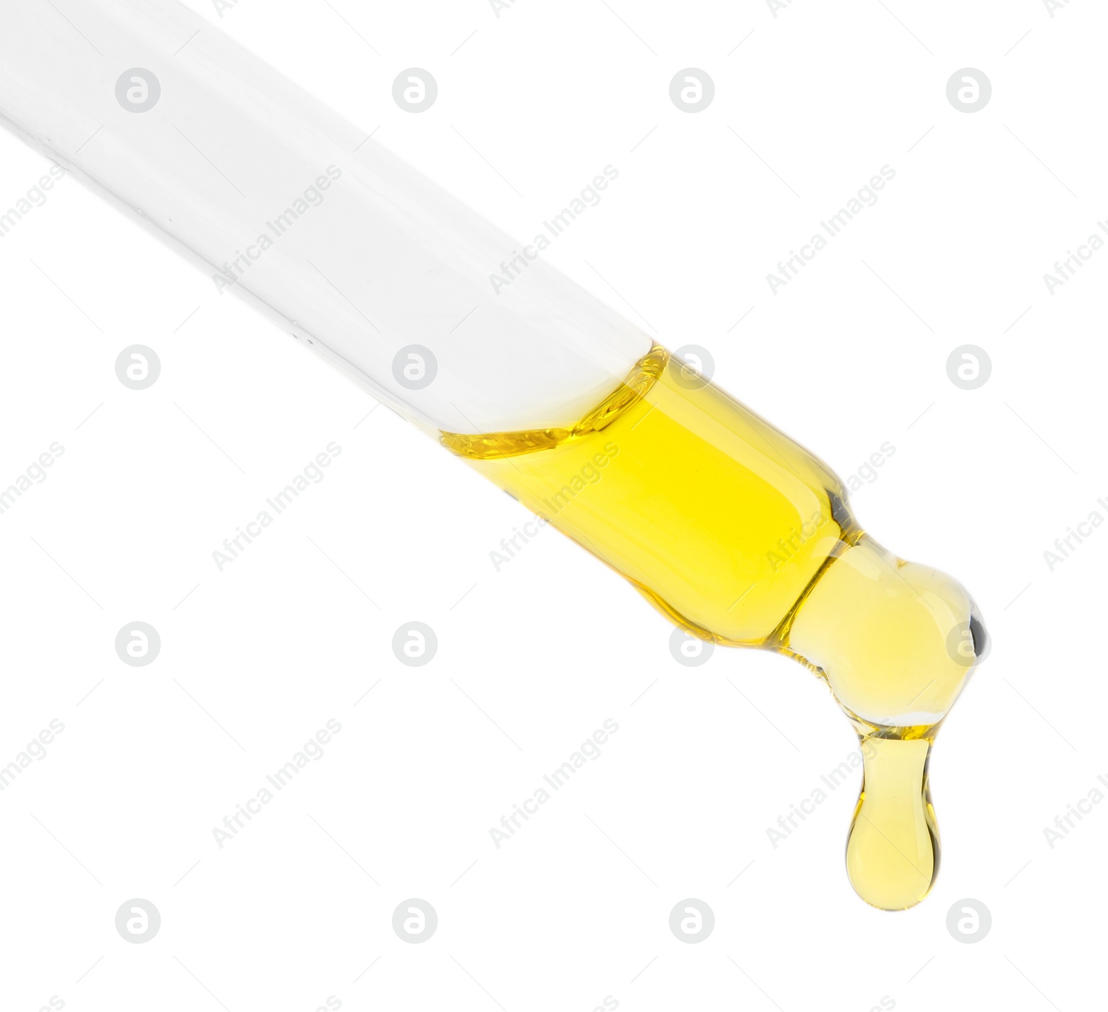 Photo of Dripping tincture from pipette isolated on white