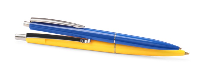 New stylish blue and yellow pens isolated on white