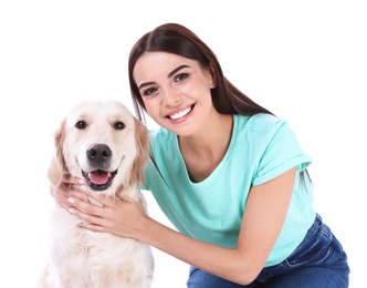 Young woman and her Golden Retriever dog on white background