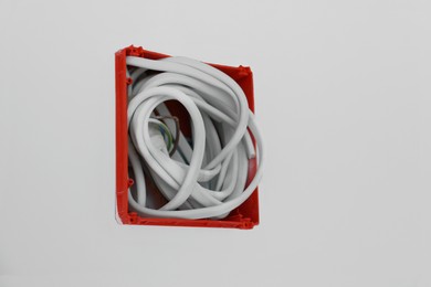 Mounting box with wires on wall, closeup