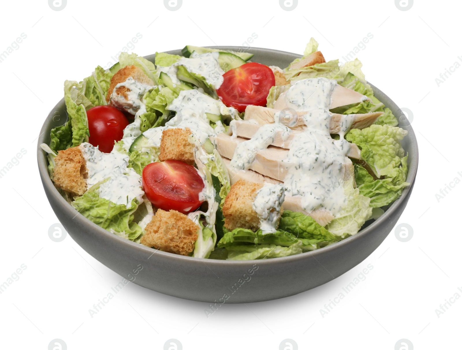 Photo of Bowl of delicious salad with Chinese cabbage, cucumber, meat and tomatoes isolated on white