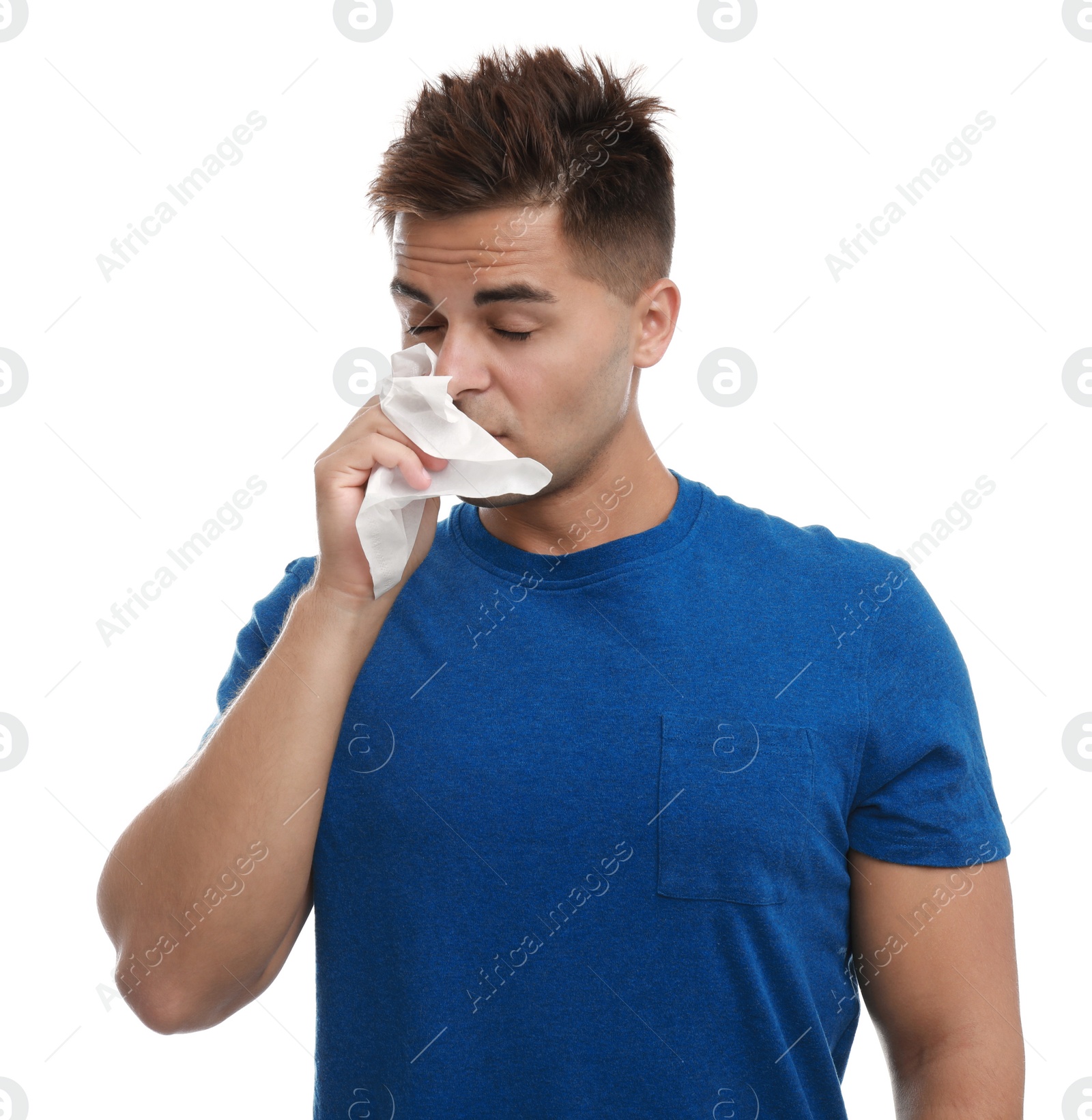 Photo of Young man suffering from allergy on white background