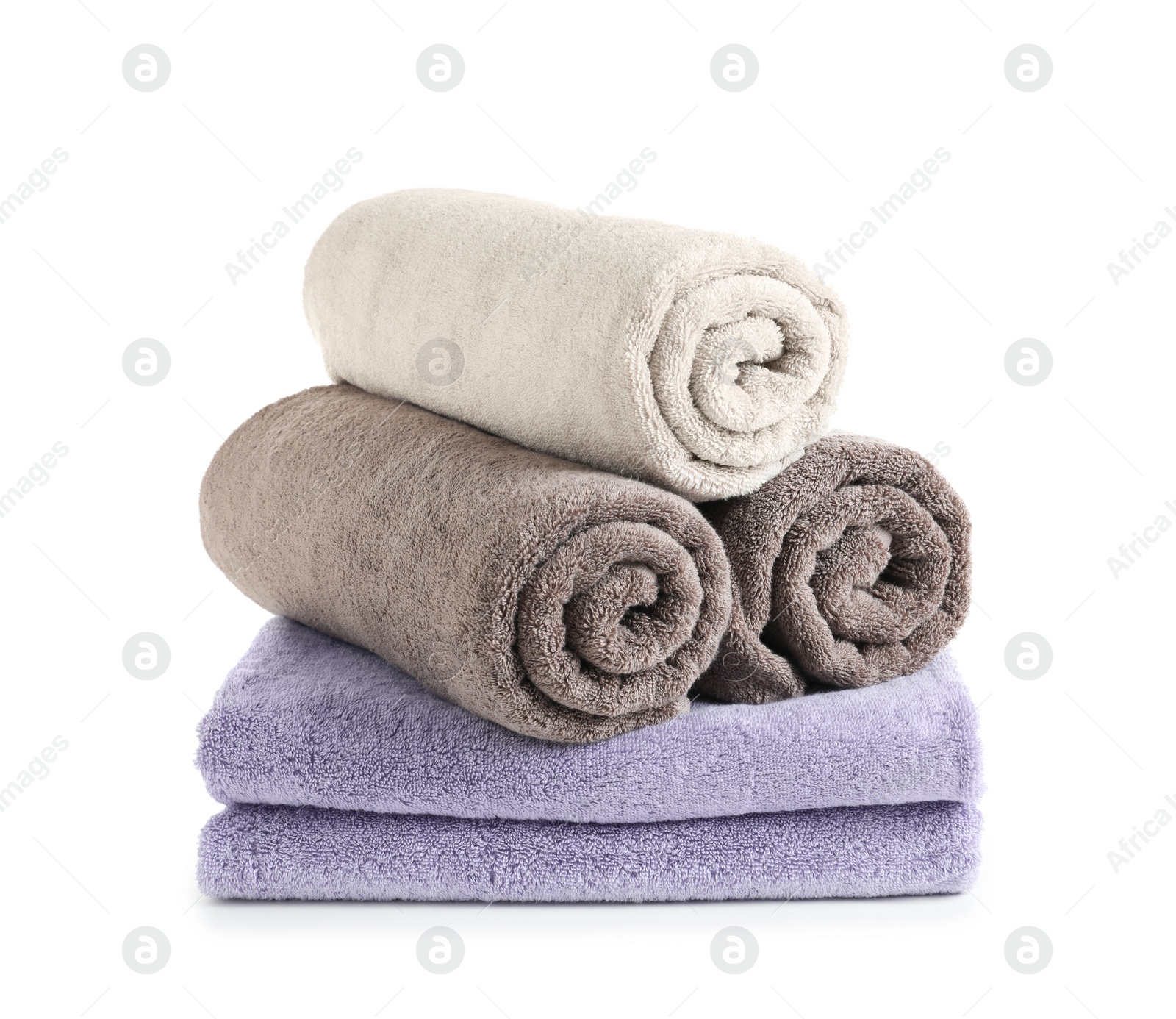 Photo of Stack of fresh towels isolated on white