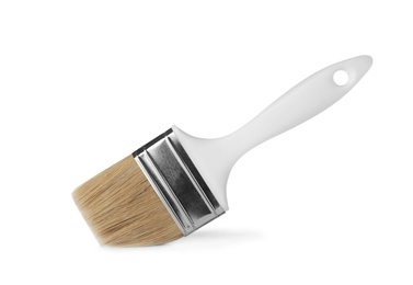 Photo of New paint brush on white background. Decorating tool