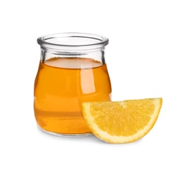 Photo of Slice of orange and tasty jelly dessert in glass jar on white background