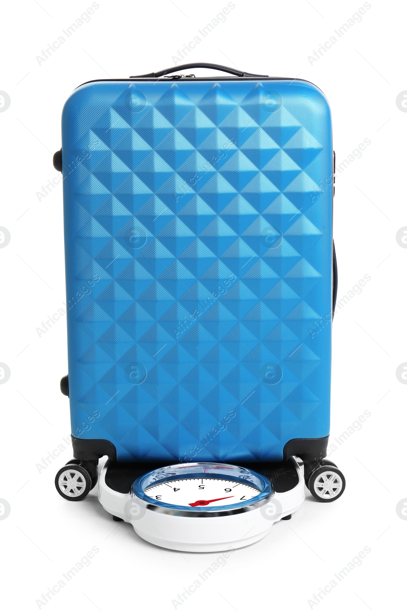 Photo of Weighing stylish suitcase on scales, white background