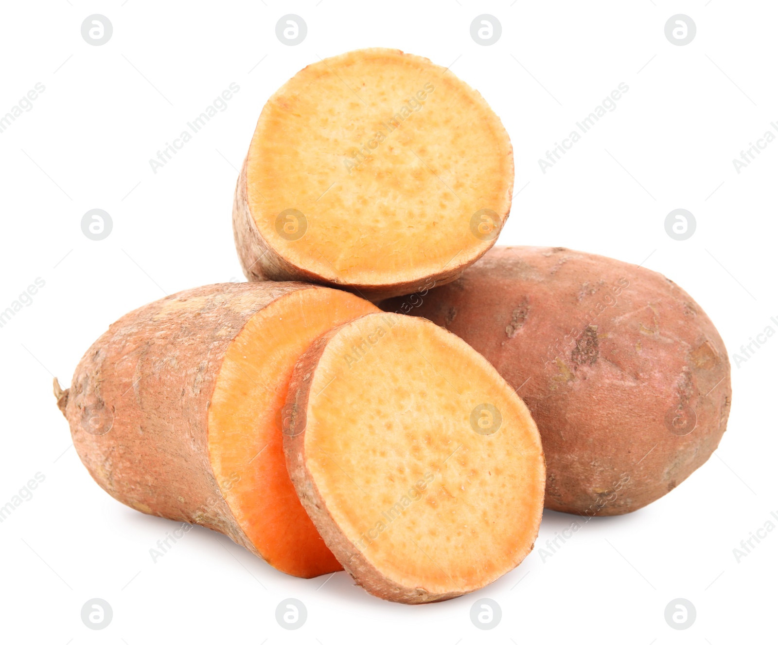 Photo of Whole and cut sweet potatoes on white background