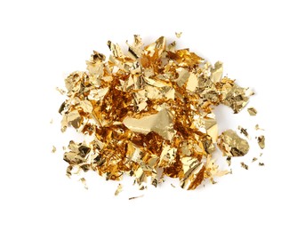 Many pieces of edible gold leaf isolated on white, top view