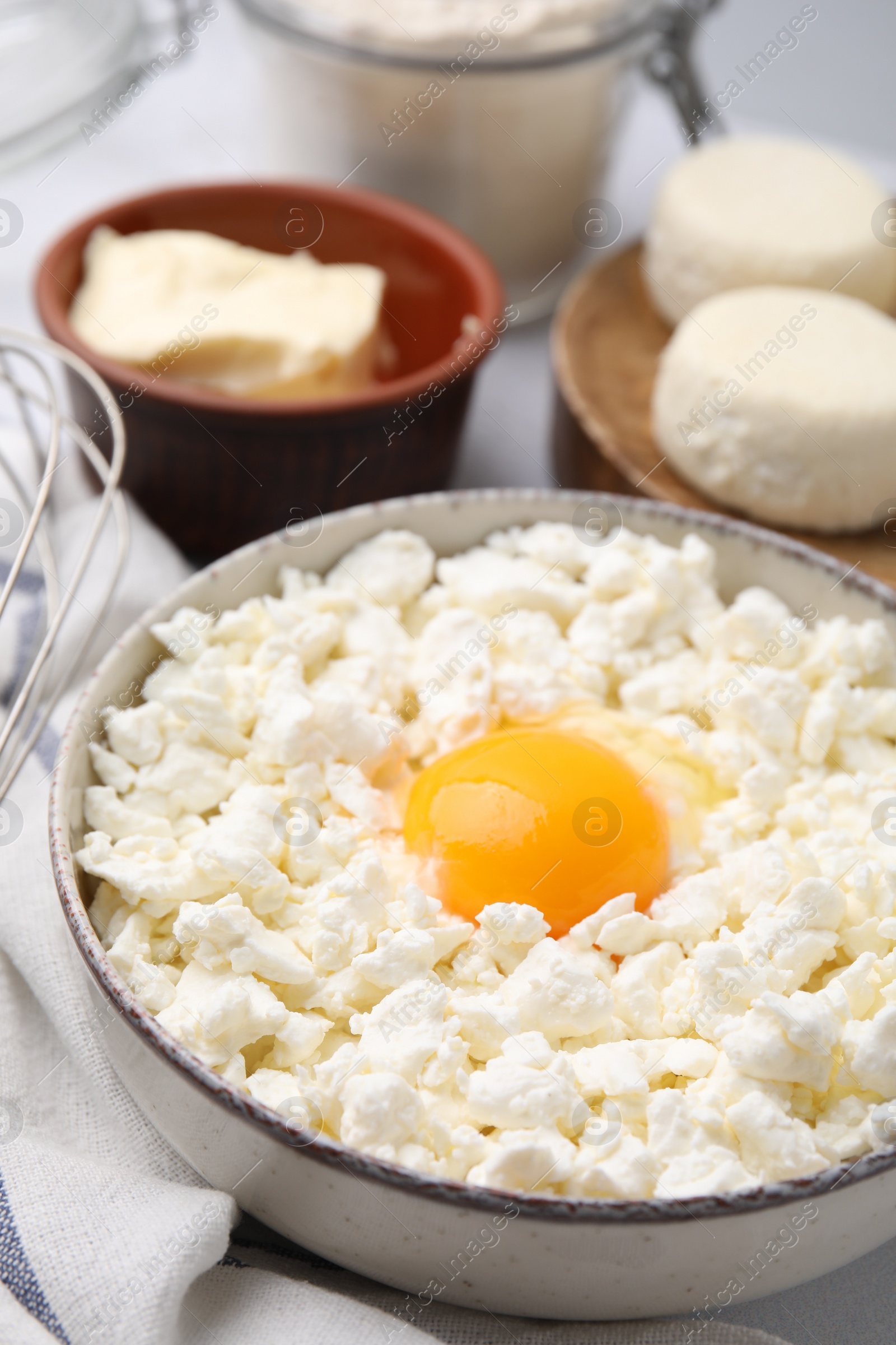 Photo of Different ingredients on table, closeup. Cooking cottage cheese pancakes