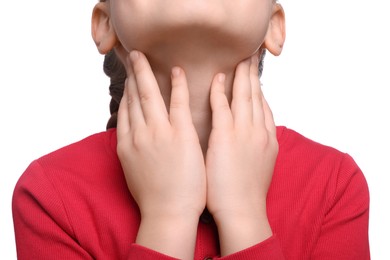 Girl suffering from sore throat on white background, closeup
