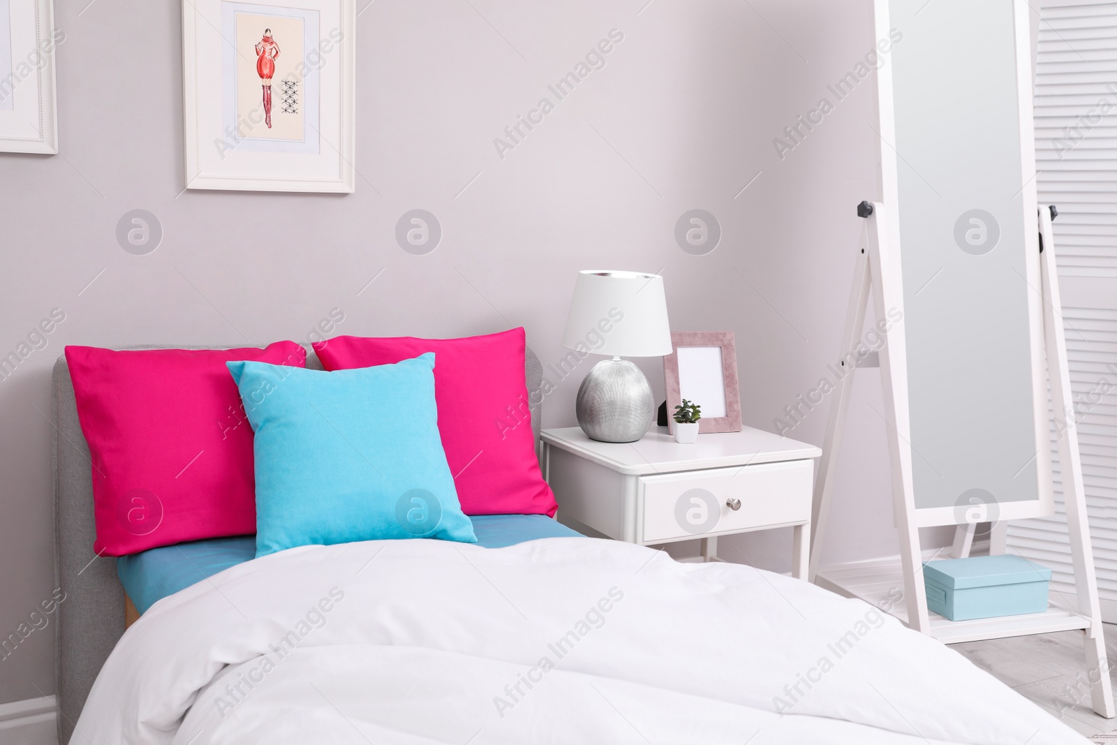 Photo of Modern teenager's room interior with comfortable bed