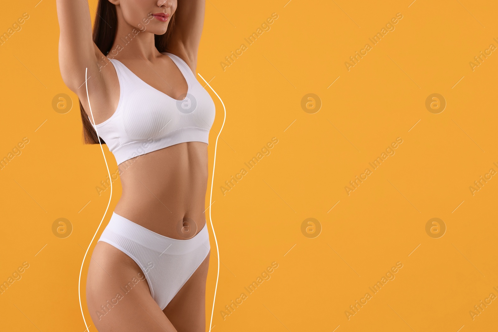 Image of Woman showing her beautiful figure on orange background, closeup. Space for text. Her body outline before cosmetic treatment