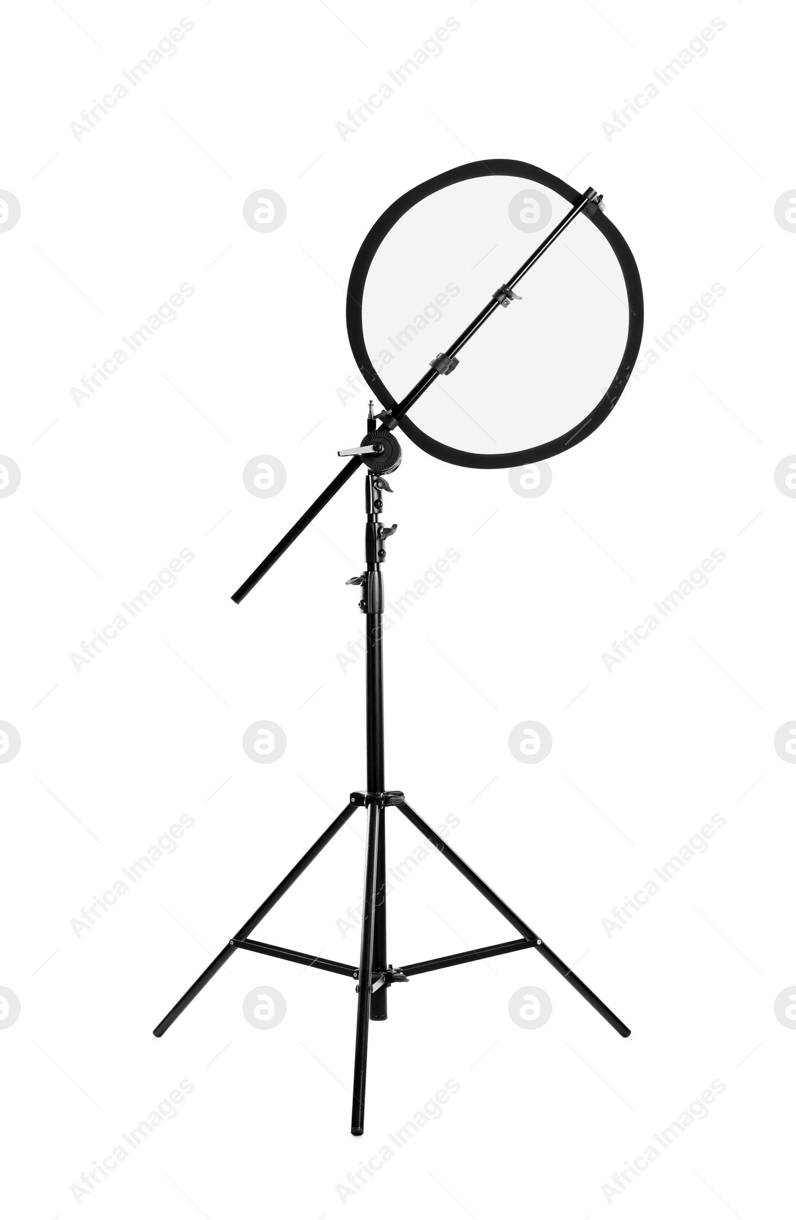 Photo of Tripod with studio reflector isolated on white. Professional photographer's equipment