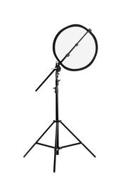 Photo of Tripod with studio reflector isolated on white. Professional photographer's equipment