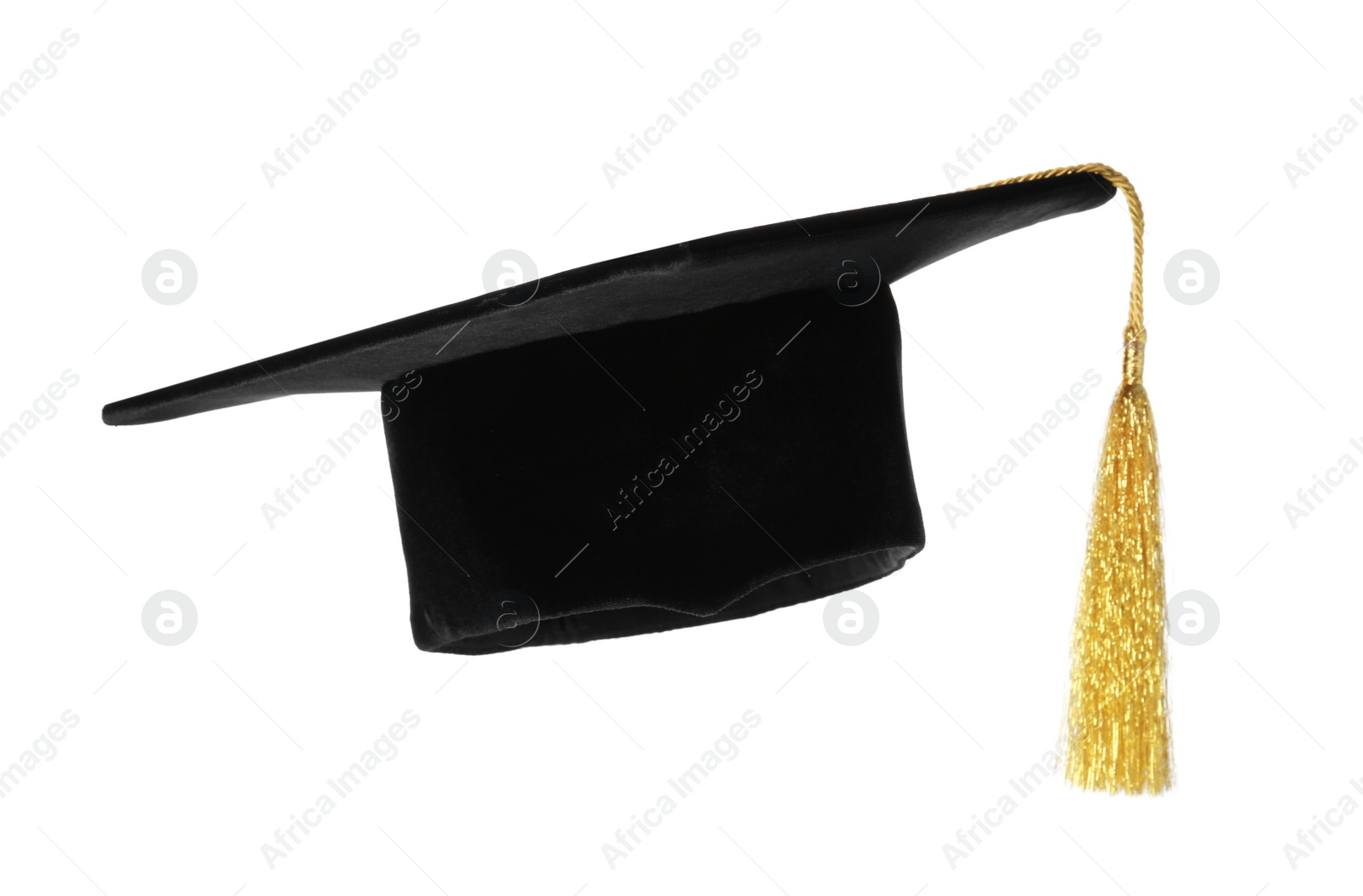 Photo of Graduation hat with gold tassel isolated on white