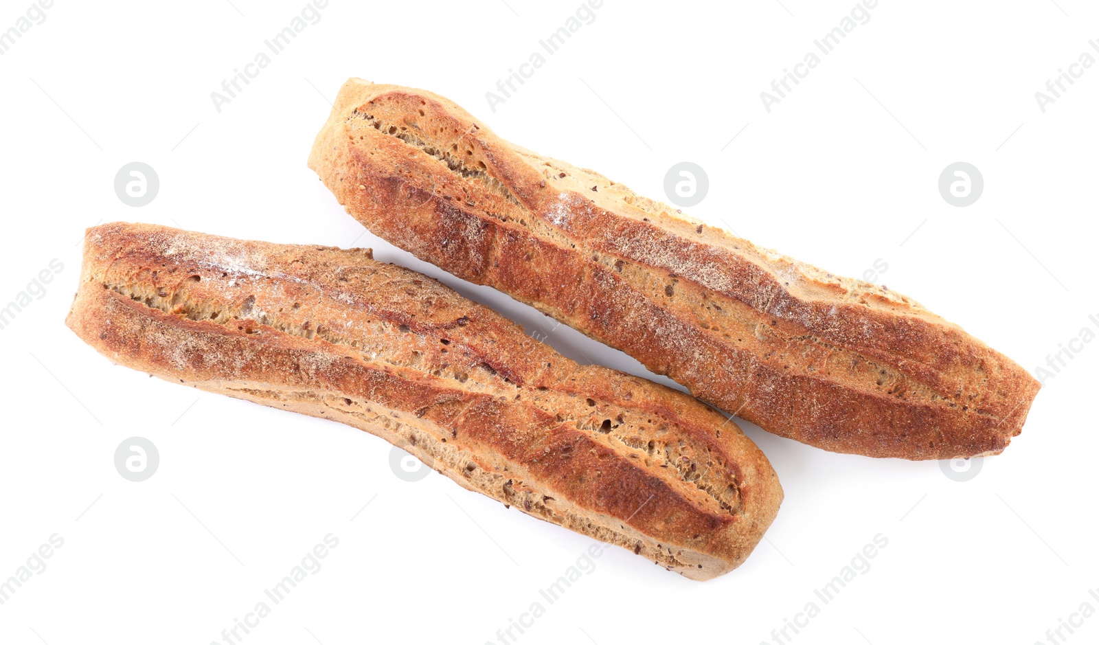 Photo of Tasty buckwheat baguettes on white background, top view. Fresh bread