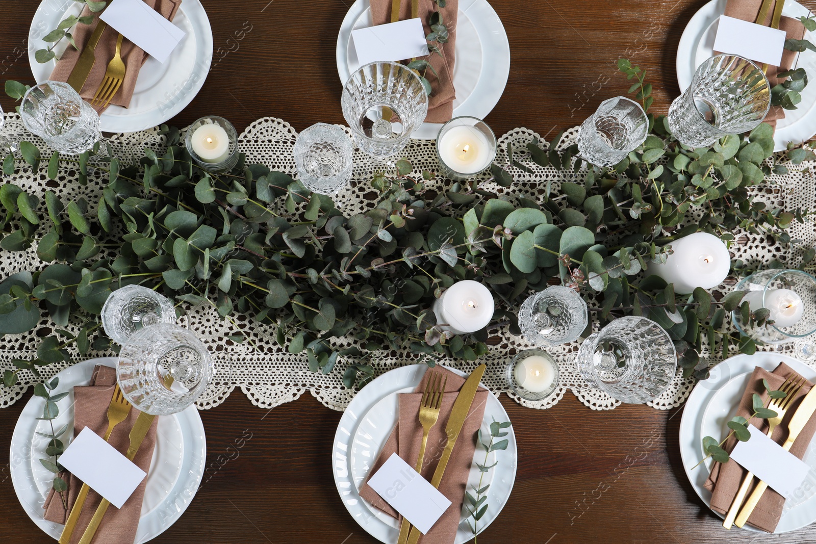 Photo of Luxury table setting with beautiful decor and blank cards, flat lay. Festive dinner