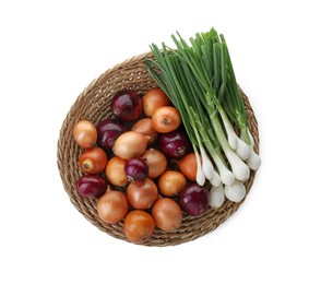 Wicker mat with different kinds of onions isolated on white, top view