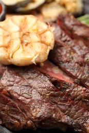 Photo of Delicious grilled beef with spices, closeup view