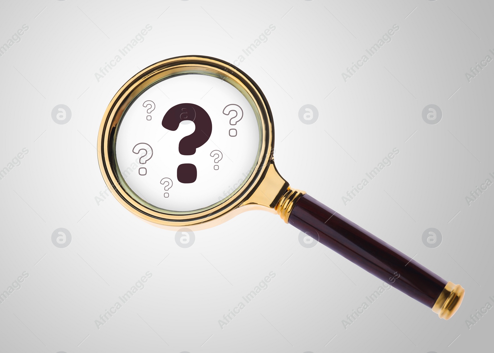 Image of Question marks on light background, view through magnifying glass