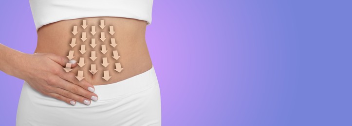Healthy digestion. Woman with down arrows on her belly against blue violet background, closeup. Banner design with space for text