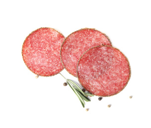 Photo of Slices of tasty sausage on white background, top view