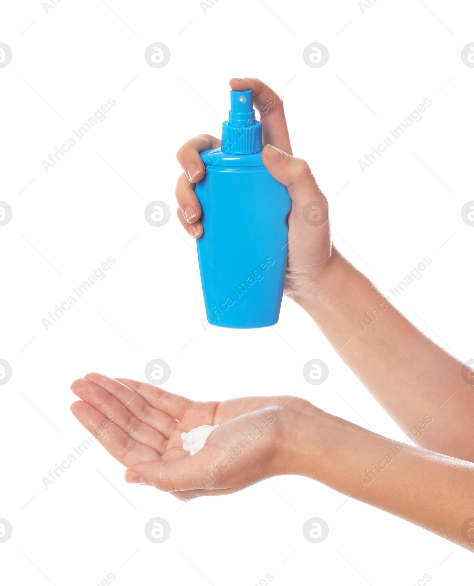 Photo of Woman with bottle of sun protection body cream on white background, closeup