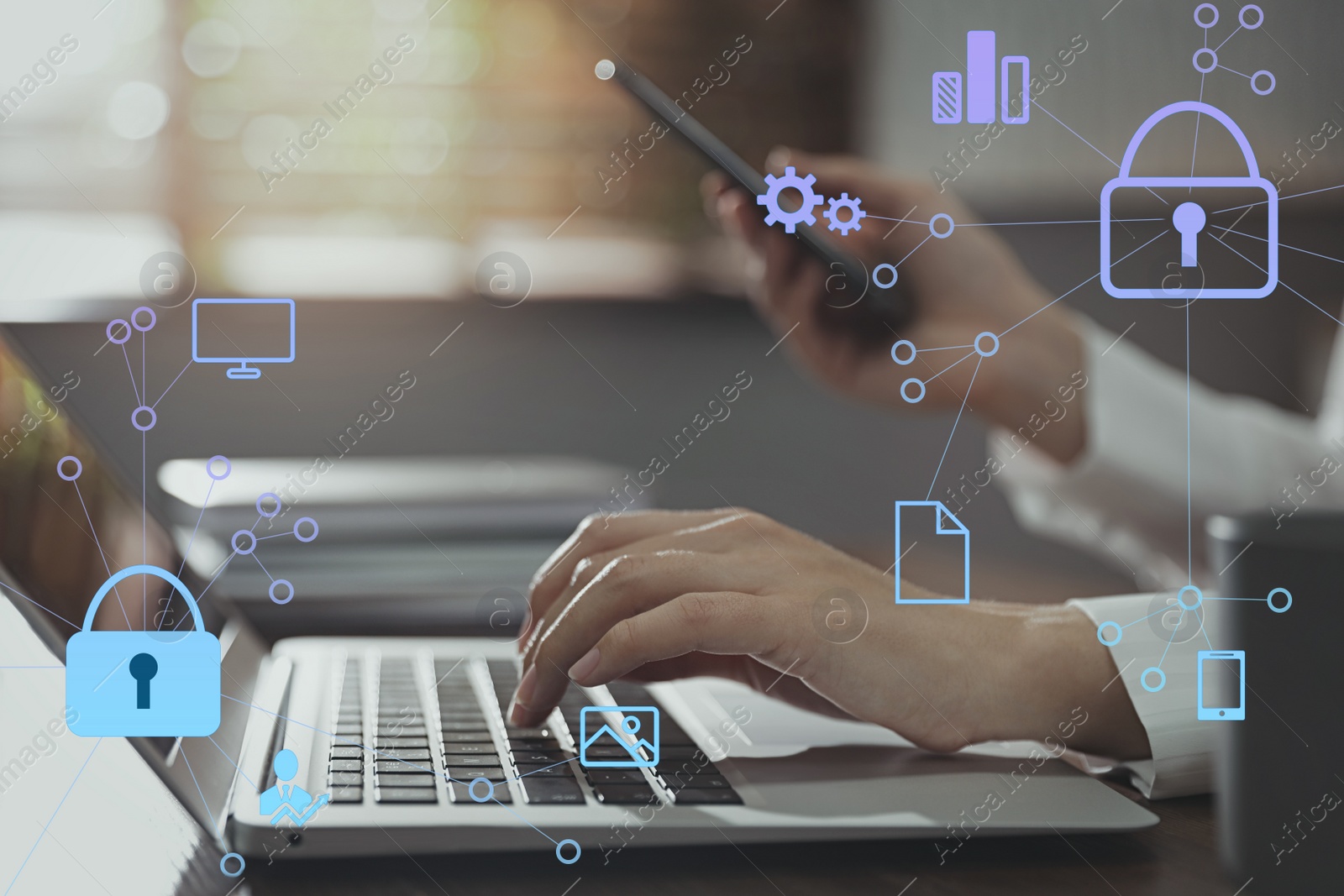 Image of Information security. Young woman using laptop at table indoors, closeup