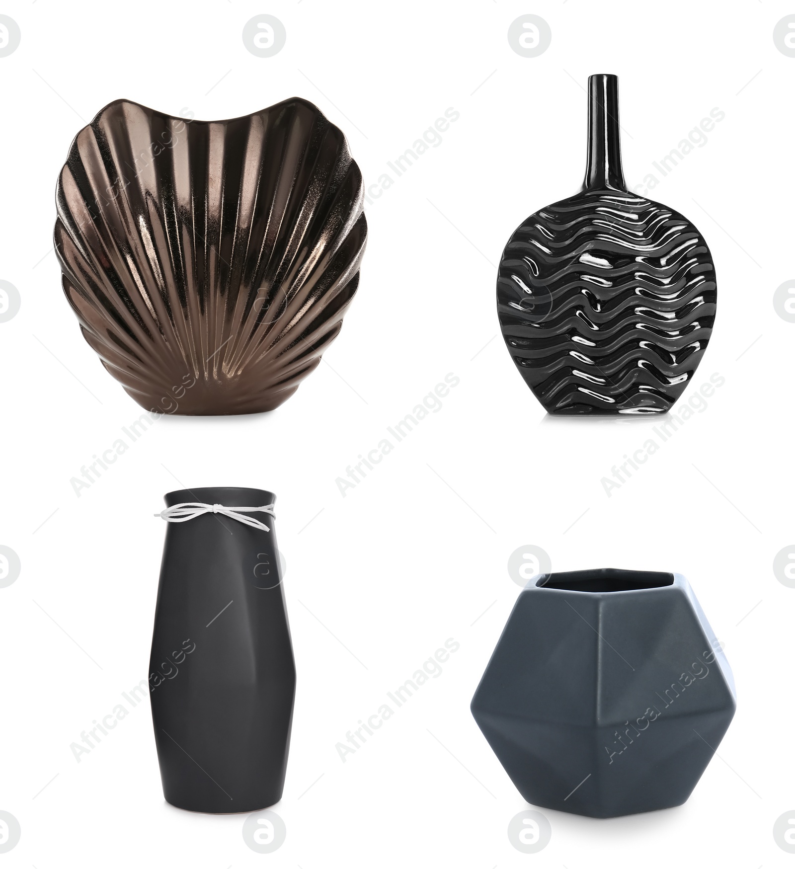 Image of Set of beautiful dark ceramic vases on white background 
