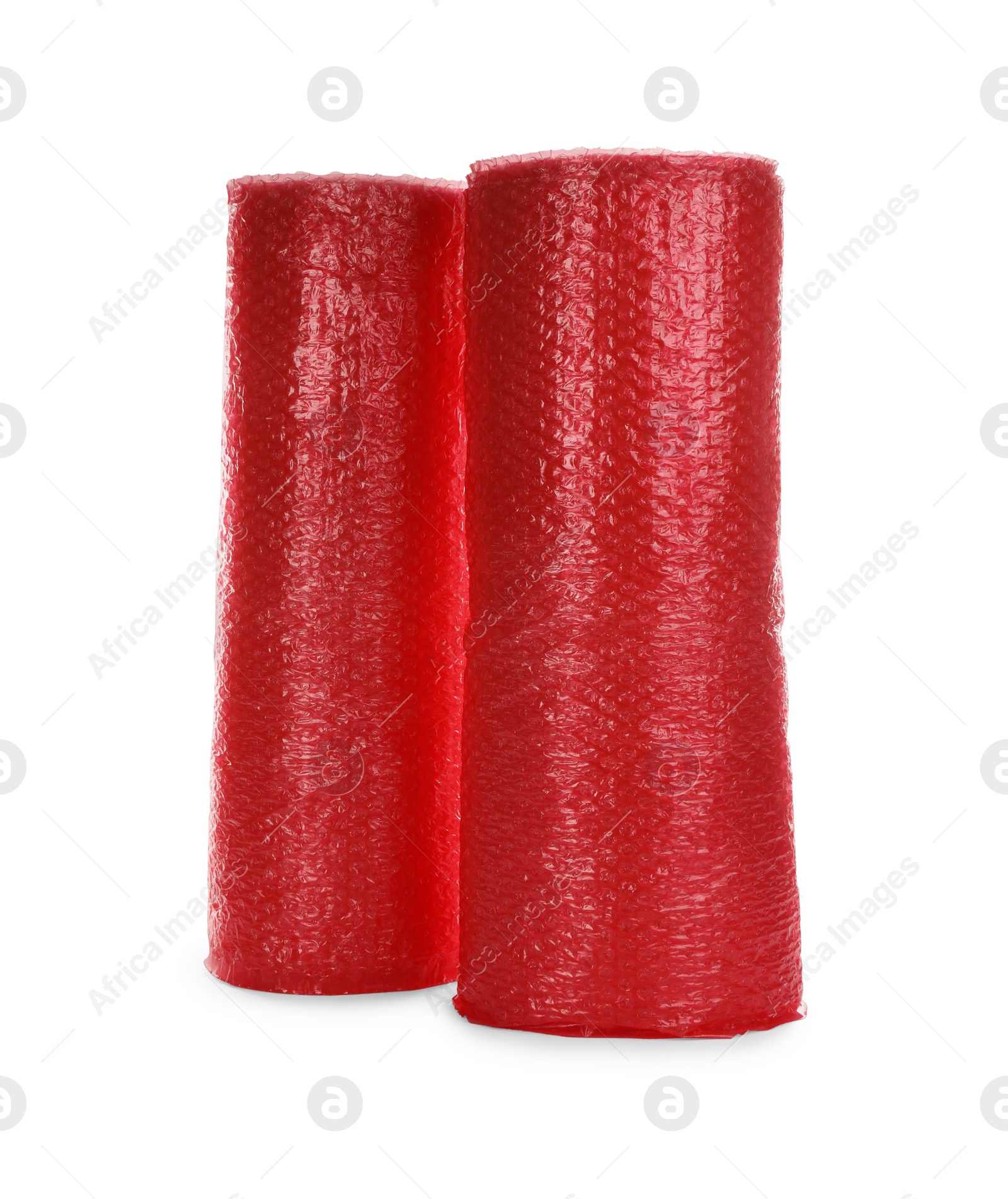 Photo of Red bubble wrap rolls isolated on white