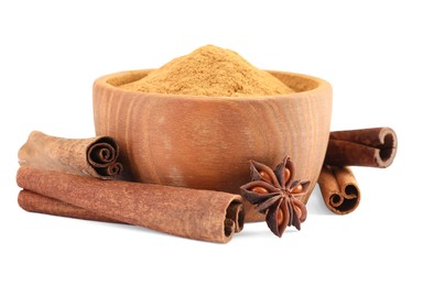 Photo of Dry aromatic cinnamon sticks, powder and anise star isolated on white