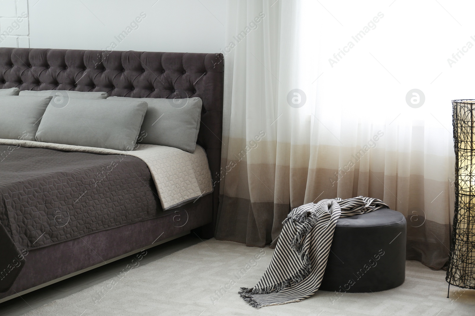 Photo of Contemporary room interior with comfortable double bed