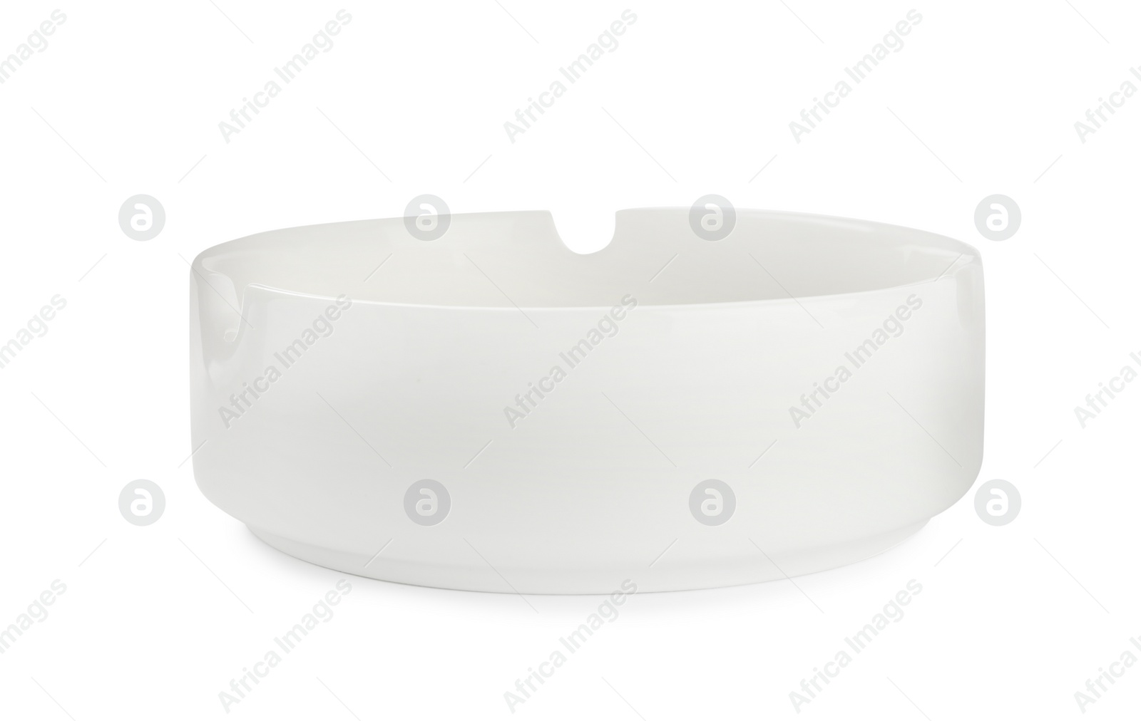 Photo of One empty ceramic ashtray isolated on white