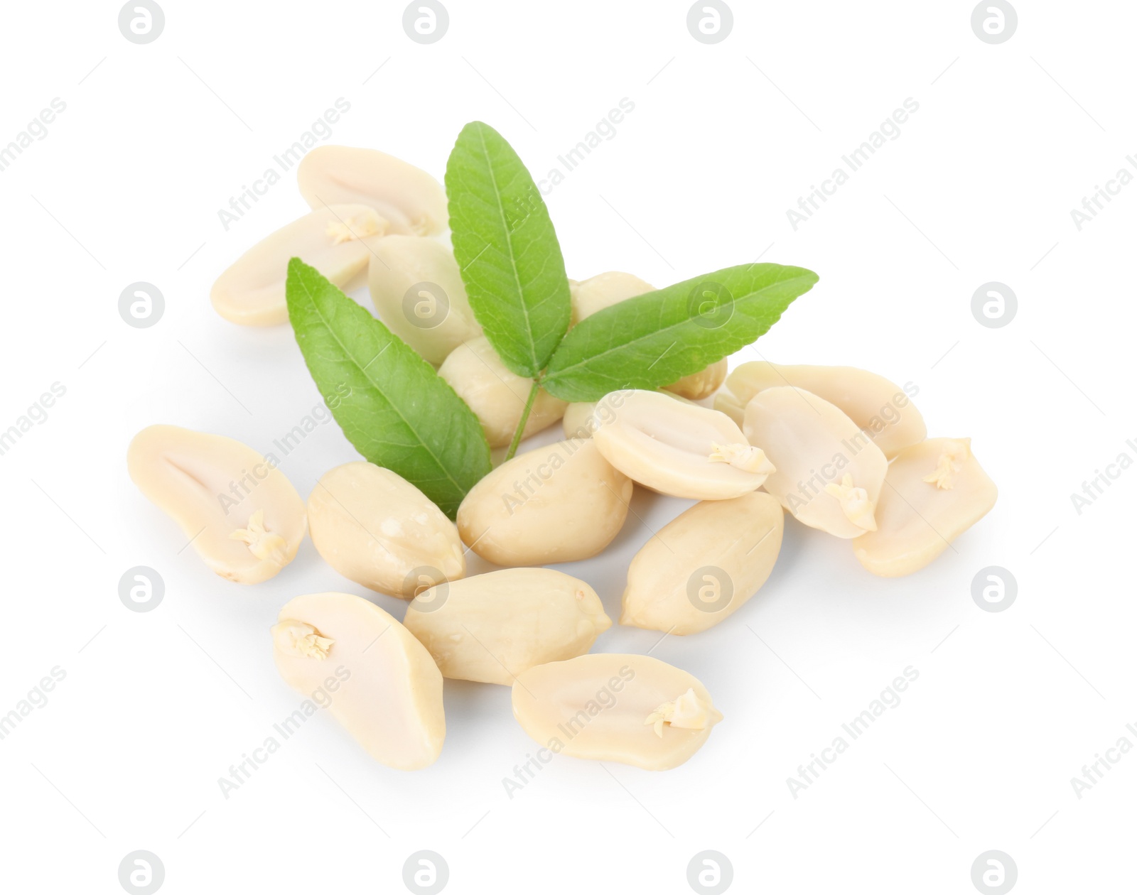 Photo of Fresh peeled peanuts and green leaves isolated on white