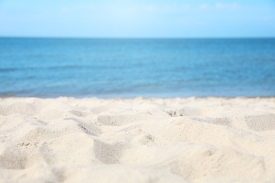 Photo of Sandy beach near sea on sunny day