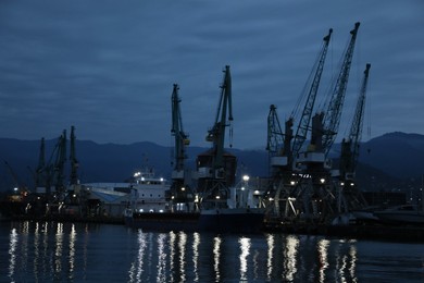 Photo of Port under dark cloudy sky in evening