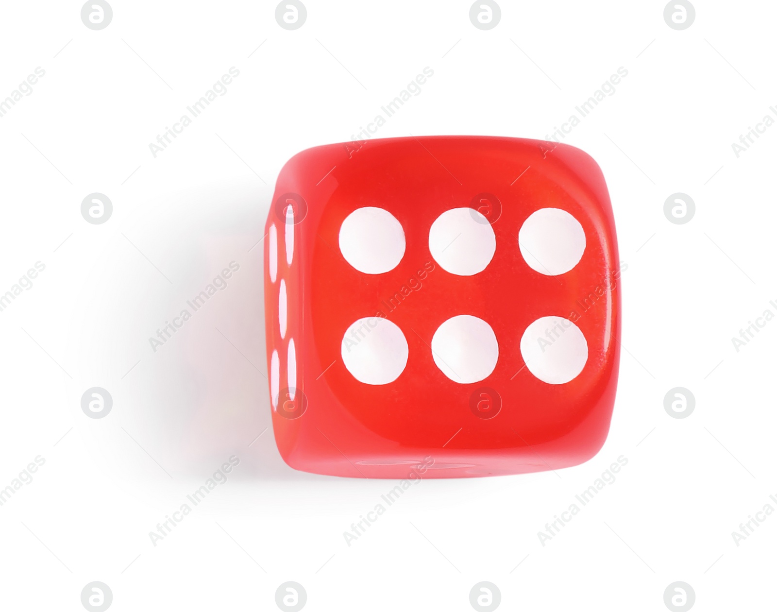 Photo of One red game dice isolated on white, top view