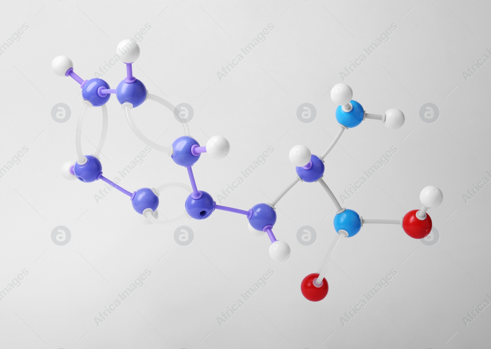 Photo of Molecule of phenylalanine on white background. Chemical model