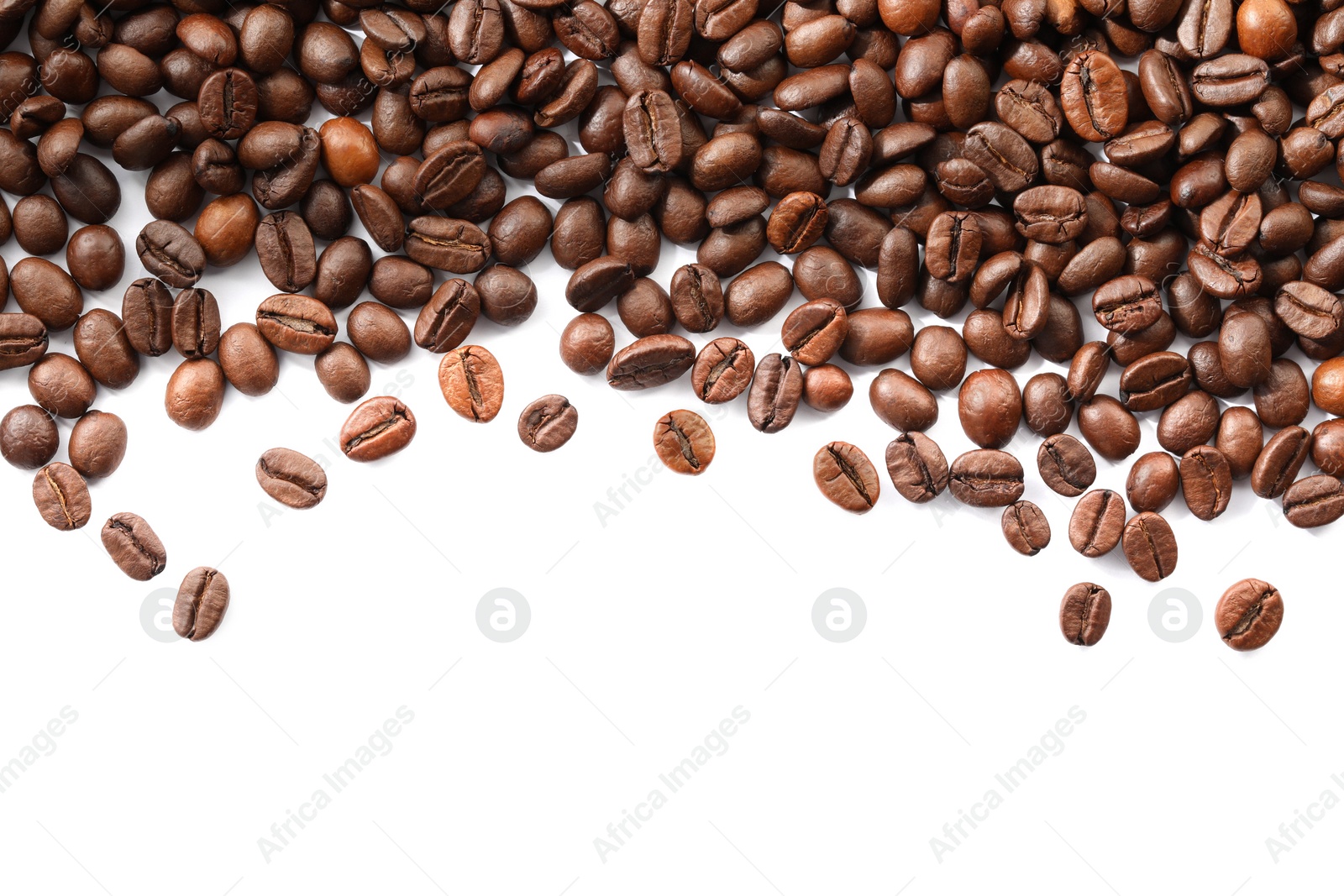 Photo of Many roasted coffee beans isolated on white , top view