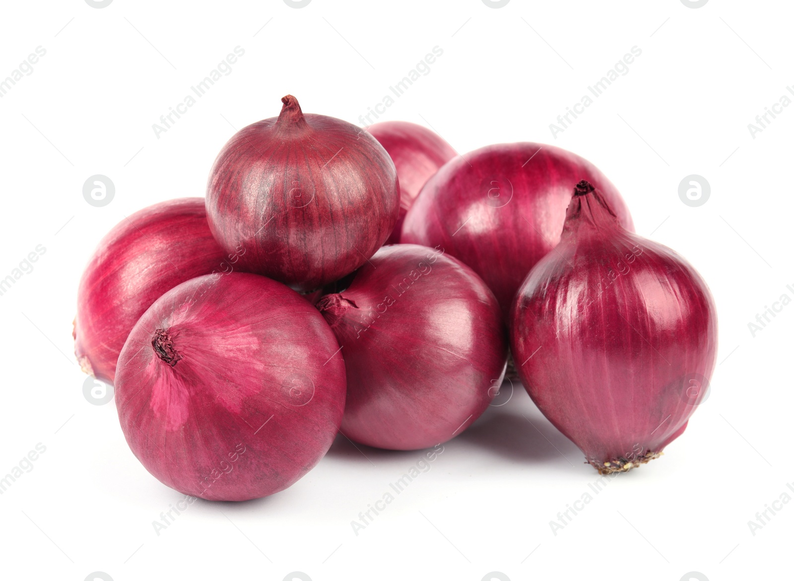 Photo of Fresh whole red onions on white background