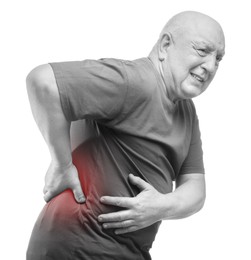 Senior man suffering from back pain on white background. Black and white effect with red accent