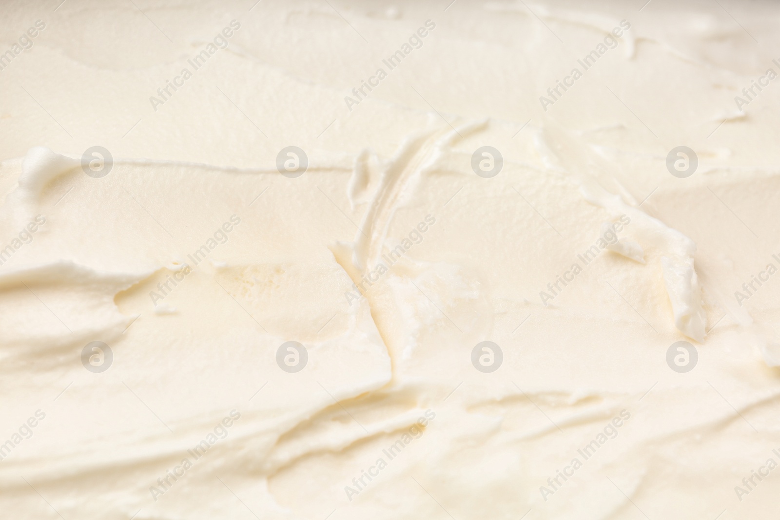 Photo of Delicious vanilla ice cream as background, top view