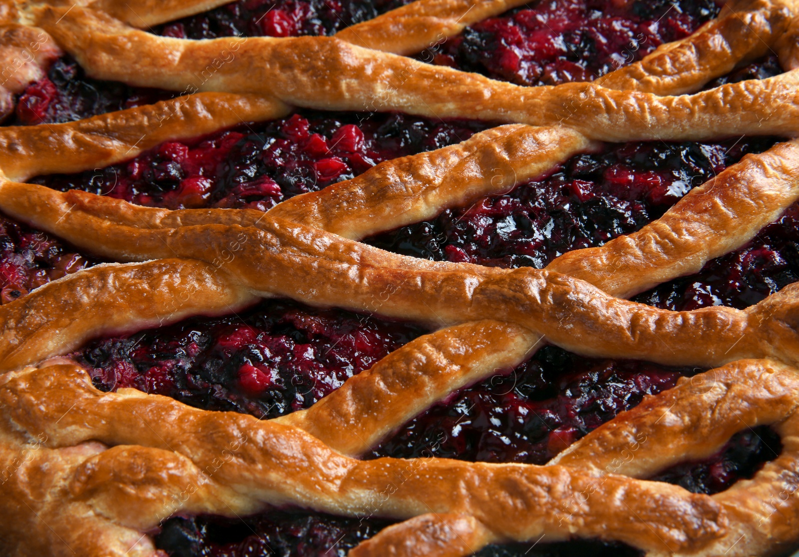 Photo of Delicious currant pie as background, closeup. Top view